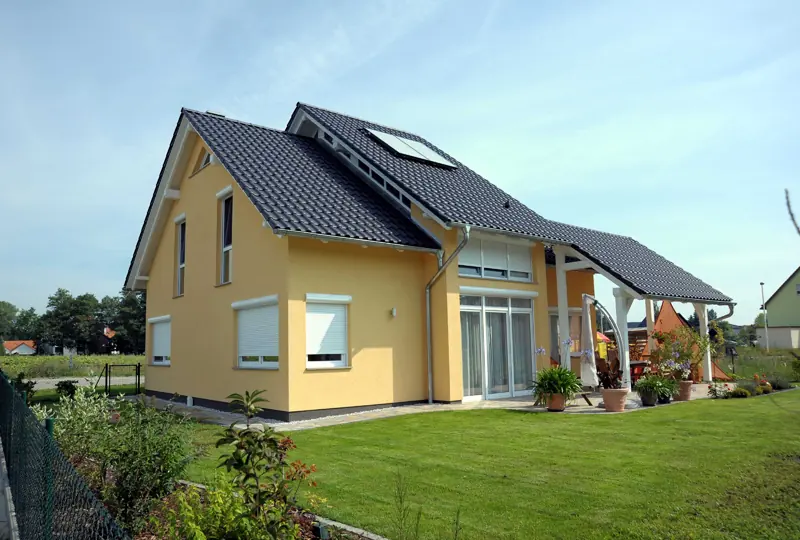 Einfamilienhaus mit Wintergarten, gebaut von Noack Bau
